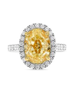 Oval Cut Yellow Diamond Ring in 18K White and Yellow Gold